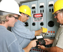 three persons doing some electrical